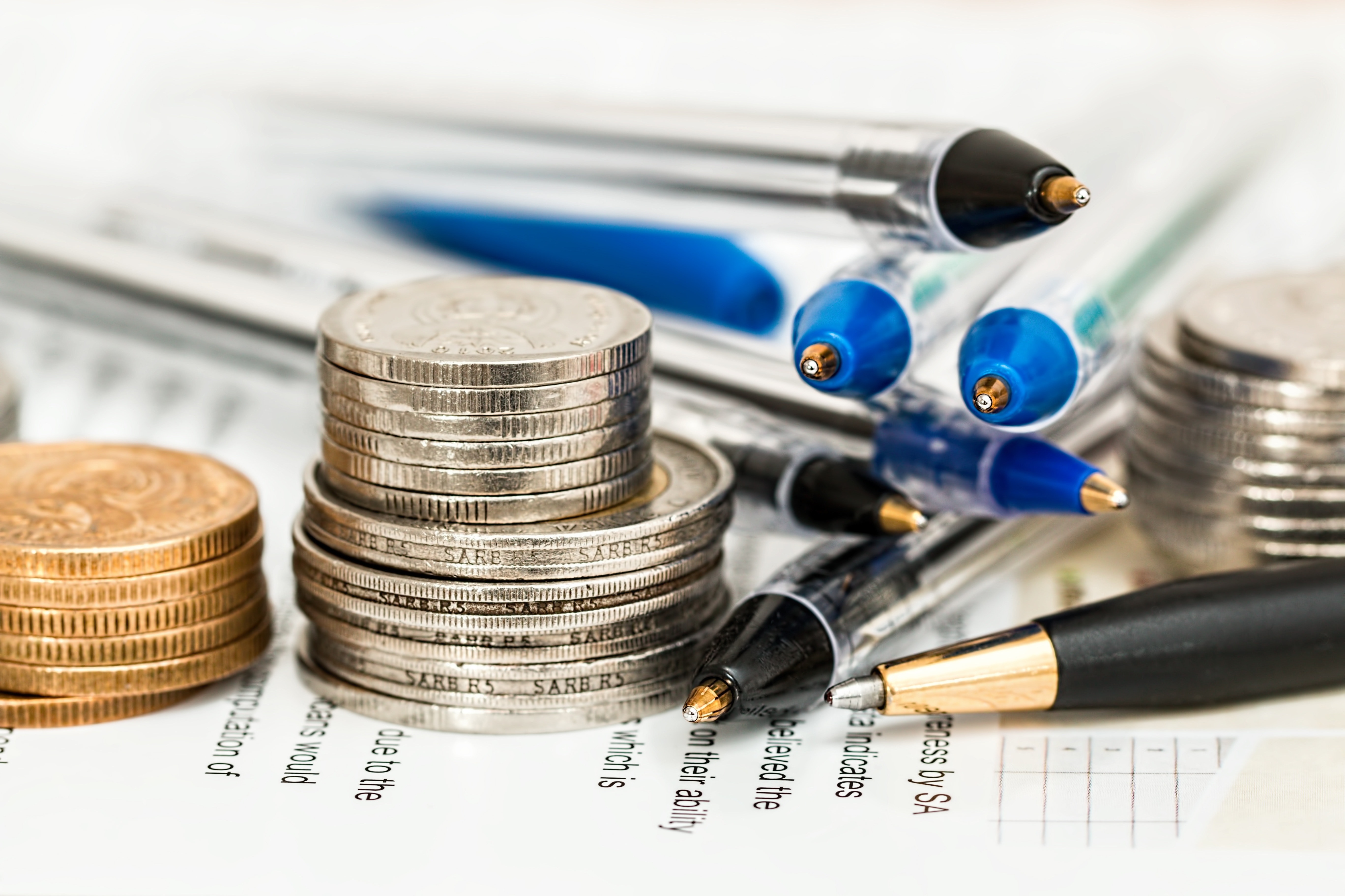 coins-currency-investment-insurance Tax Preparation